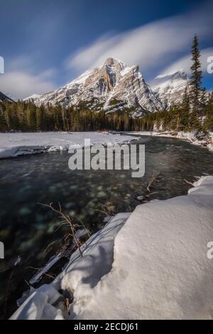 Afternoon Winter light on Mount Kidd in Kananaskis Country of Alberta, Canada. Stock Photo