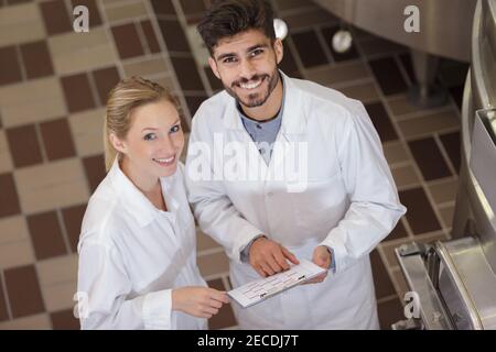high angle view of two brewery workers Stock Photo