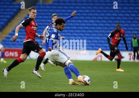 Cardiff, UK. 13th Feb, 2021. Josh Murphy of Cardiff City shoots and scores his teams 3rd goal. EFL Skybet championship match, Cardiff city v Coventry city at the Cardiff City Stadium in Cardiff, Wales on Saturday 13th February 2021. this image may only be used for Editorial purposes. Editorial use only, license required for commercial use. No use in betting, games or a single club/league/player publications. pic by Andrew Orchard/Andrew Orchard sports photography/Alamy Live news Credit: Andrew Orchard sports photography/Alamy Live News Stock Photo