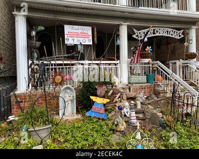 Eclectically decorated front yard in Brooklyn, New York. Stock Photo