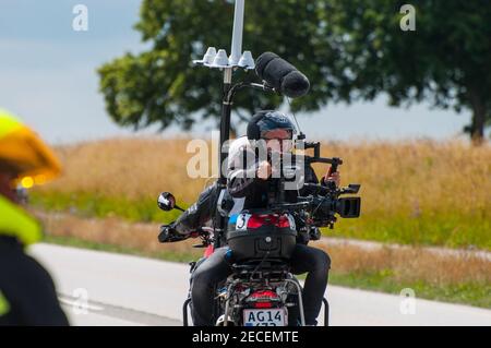 Vordingborg Denmark - June 26. 2016: Cameraman on back of a motorcycle at a bicycle race Stock Photo