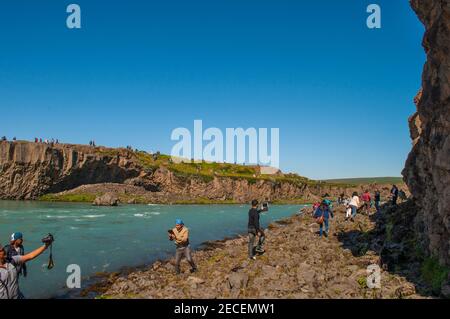 Godafoss Iceland - July 18. 2016: Tourists taking selfies in front of Godafoss Waterfall in North Iceland Stock Photo