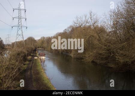 Harefield, UK. 13th February, 2021. Ice formed on the surface of the Grand Union Canal in the Colne Valley. The current cold spell is expected to be replaced by milder conditions after tomorrow. Credit: Mark Kerrison/Alamy Live News Stock Photo