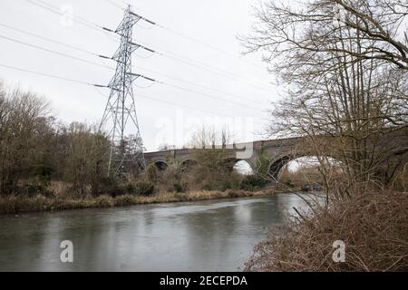 Harefield, UK. 13th February, 2021. Ice formed on the surface of the Grand Union Canal in the Colne Valley. The current cold spell is expected to be replaced by milder conditions after tomorrow. Credit: Mark Kerrison/Alamy Live News Stock Photo