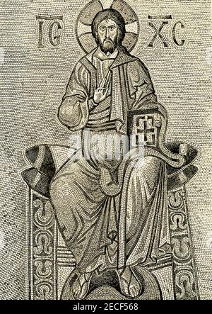 This 1880s illustration shows Christ in Byzantine times - the depiction is a mosaic from the chapel of Martorana at Palermo in Sicily. The church known as La Martorana is in Palermo’s Piazza Bellini. It was founded in 1143 by an admiral of King Roger II’s, George of Antioch, whose rank gave it its original name of Santa Maria dell’Ammiraglio. There are strong Greek and Byzantine influences in the mosaics of Christ (seen here), Madonna, and the saints. Stock Photo