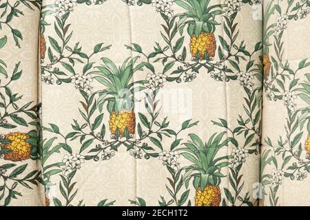 background, fabric curtain with pineapple and plant pattern, texture detail Stock Photo