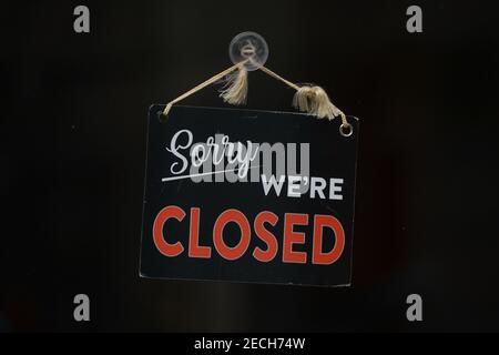 Dublin, Ireland. 13th Feb, 2021. A sign saying Sorry We're Closed seen at the door of a closed business promises. Credit: SOPA Images Limited/Alamy Live News Stock Photo