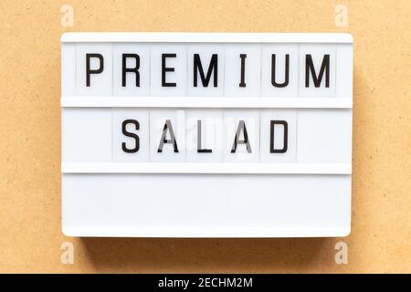 Lightbox with word premium salad on wood background Stock Photo