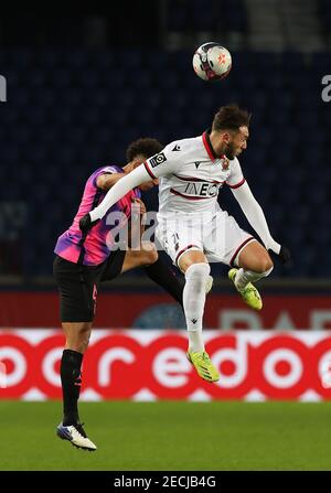 Paris, France. 13th Feb, 2021. Paris Saint-Germain's Thilo Kehrer (L) vies with Nice's Amine Gouiri during the French Ligue 1 football match between Paris Saint-Germain (PSG) and Nice (OGCN) at the Parc des Princes stadium in Paris, France, Feb. 13, 2021. Credit: Gao Jing/Xinhua/Alamy Live News Stock Photo