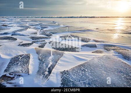 Beautiful landscape of Ice hummock and cracks at frozen lake Baikal, Russia Stock Photo