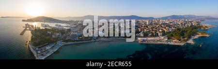 Split, Croatia - Aug 13, 2020: Aerial panoramic drone shot of Bavice city beach during sunset hour in summer Stock Photo