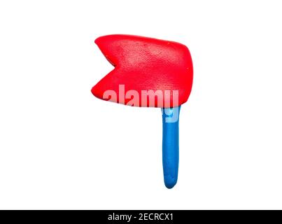 Red flag pointer isolated. Modelling clay navigation sign on white background. Pointer flag in naive nursery style. Children hobby modeling. Handmade Stock Photo