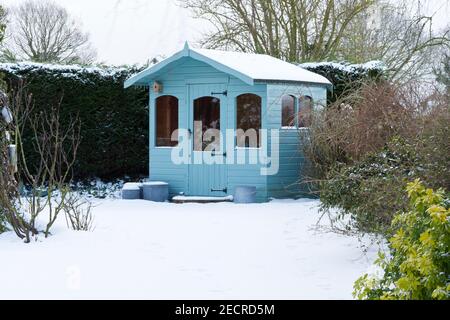 A snow covered summer house in winter Stock Photo