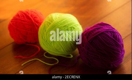 Clew of green thread for knitting isolated on white background Stock Photo