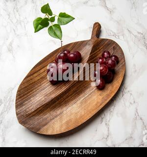 hand carved wooden snack board Stock Photo