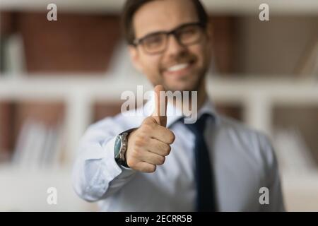 Close up of smiling man show thumb up Stock Photo
