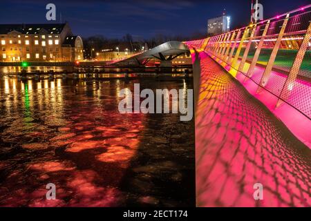 Copenhagen lights festival at night with frozen canal on Lille Langebro bridge, Denmark Stock Photo