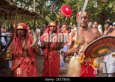 Payyanur, India - December 6, 2019: Velichappadu, the Oracles of Kerala during traditional religious village ceremony, South India Stock Photo