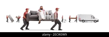 Saudi arab man drinking a cup of tea and sitting on a sofa carried by movers isolated on white background Stock Photo