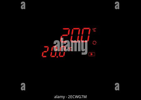 The digital thermometer on the equipment shows 20 degrees Celsius on a ...