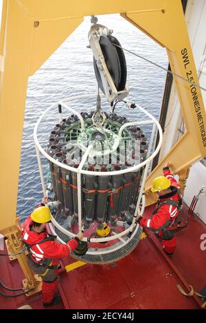 Deploying A CTD Rosette from the CCGS Amundsen during a scientific expedition by ArcticNet and ATLAS scientists Stock Photo