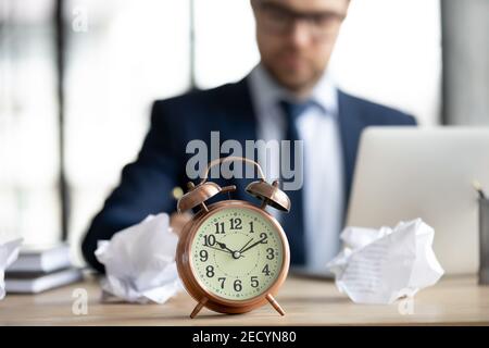 Close up of businessman work on laptop meeting deadline Stock Photo