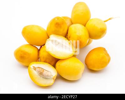 golden dates on white background Stock Photo
