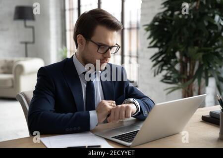 Caucasian businessmen work on laptop worry about deadline Stock Photo