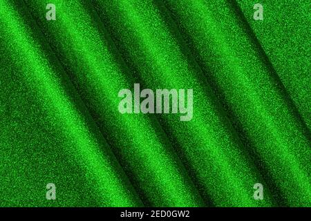 Green glittered velvet close up. Texture and background Stock Photo