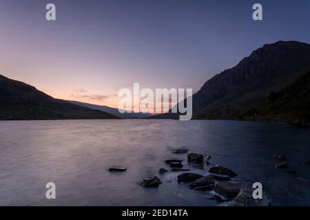 Dawn breaking over Llyn Ogwen, Snowdonia, North Wales Stock Photo