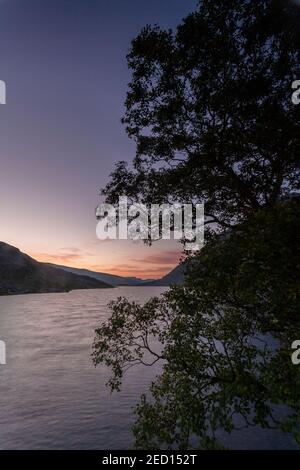 Dawn breaking over Llyn Ogwen, Snowdonia, North Wales Stock Photo