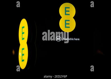 A close-up of an EE store sign Stock Photo - Alamy