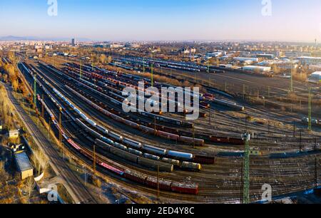 marshalling yard for railway cargo trains in Budapest. This is on Ferencvaros district. Aerial photo about lot empty and full trains. Stock Photo