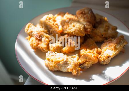 Fried bread covered chicken wings. Selective focus Stock Photo