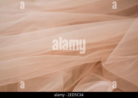 delicate soft beige fabric abstract background with blur Stock Photo