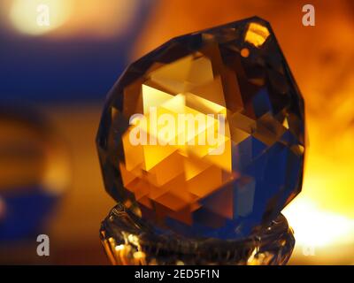 Facet Crystal Backlit in a Warm Soft Glow Stock Photo