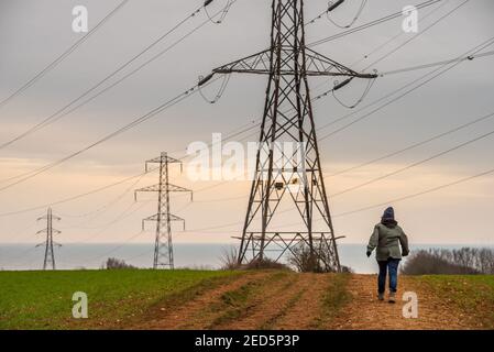 Brighton, February 14th 2021: Electrical pylons in Mile Oak in East Sussex Credit: Andrew Hasson/Alamy Live News Stock Photo