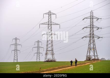 Brighton, February 14th 2021: Electrical pylons in Mile Oak in East Sussex Credit: Andrew Hasson/Alamy Live News Stock Photo