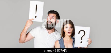 Quarrel between two people. Pensive man and a thoughtful woman. Husband and wife not talking, being in quarrel. Couple in quarrel. Question mark. A Stock Photo