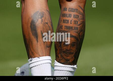 Soccer Football - Premier League - Fulham v Newcastle United - Craven Cottage, London, Britain - May 12, 2019 General view of the tattoos on the legs of Newcastle United's Kenedy before Soccer Football - Premier League - Fulham v Newcastle United - Craven Cottage, London, Britain - May 12, 2019 General view of the tattoos on the legs of Newcastle United's Kenedy before