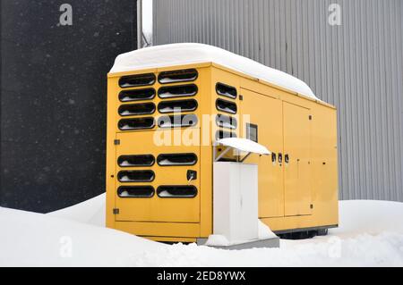 Mobile diesel generator for emergency power supply in winter. Stock Photo