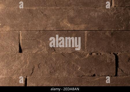 Dark stony tiles as a background Stock Photo