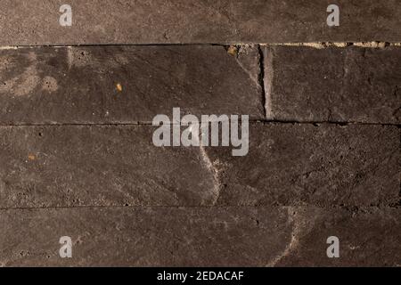 Dark stony tiles as a background Stock Photo