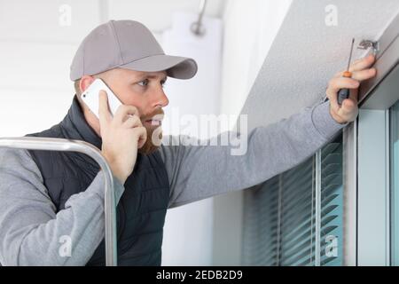windows installation workers installing windows Stock Photo