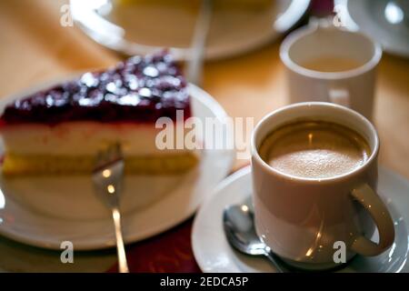 Delicious Cake and the Drinks on Table Stock Photo