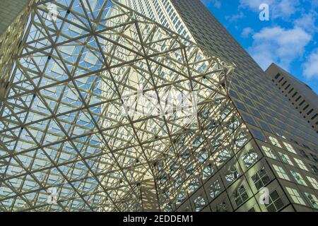 An elaborate metal grid work cover the outdoor plaza of the Southeast Financial Center in Miami, Florida. Stock Photo
