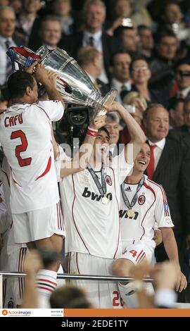 AC Milan's Kaka celebrates with the trophy during the UEFA 