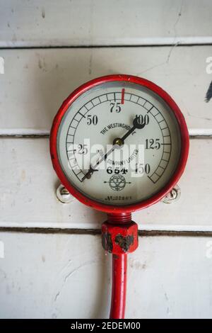 Queenstown New Zealand - February 28 2015; Old-world transportation images of close-up gauges or components on vintage steam engine train Stock Photo