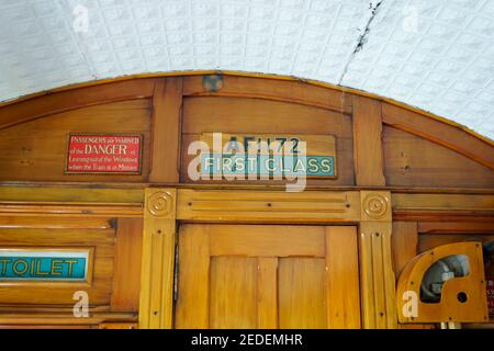 Queenstown New Zealand - February 28 2015; Old-world transportation images of close-up signs or components in interior of First Class carriage in vint Stock Photo