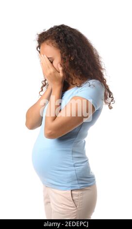 Stressed pregnant African-American woman on white background Stock Photo